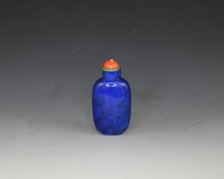 Lapis Lazuli Chinese snuff bottle - elegant with sloping shoulders and vivid color.