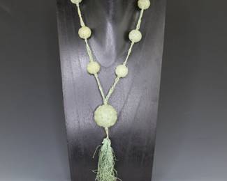 Huge reticulated jade beads on a silk braided cord necklace