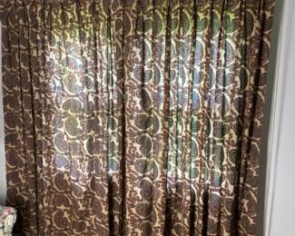 84 Pleated Brown And Cream Paisley Patterned Curtain Panels With Cord Drawn Traverse Drapery Rod