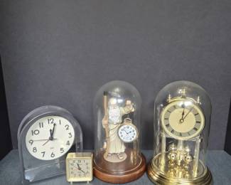 Four Decorative Analog Clocks