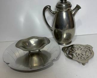 106 mixedvintagepewterandaluminumtablew