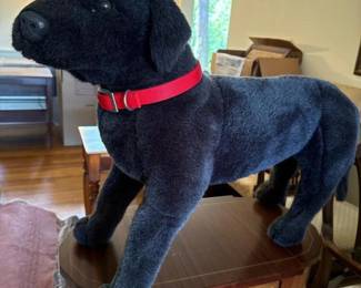 039 largeblackplushdogwithredcollar