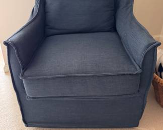 Upholstered Swivel Rocker Chair. Measures 27" W x 34" D. 