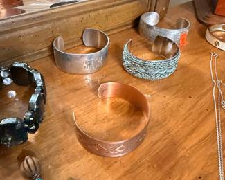 Assorted Vintage Cuff Bracelet Collection: Copper, Sterling Silver, and Silver-Plated