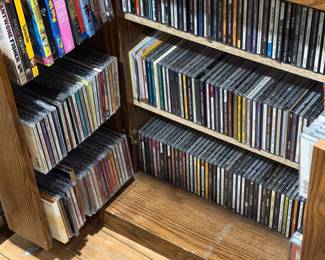 Assorted Music CDs, DVDs, and Media Cabinet