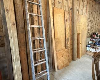 Metal Ladder; Various pieces of plywood; 2x4", 2x6", etc.