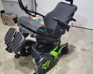 Permobil F3 Power Wheelchair.  The chair lifts, tilts, feet up; moves in all directions.