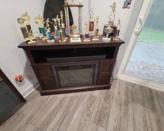 Dark Wood Electric Fireplace Media Console. Produces Heat with Blowers.