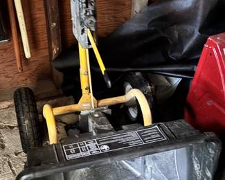 Drop spreader attachment for tractor