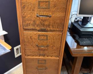 Oak finish file cabinet
