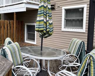 Patio table for chairs and umbrella