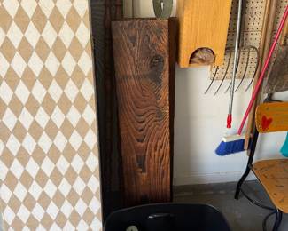 Wood shelves with decorative metal brackets 