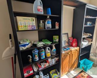 2 Shelving Units filled with Cleaning Supplies