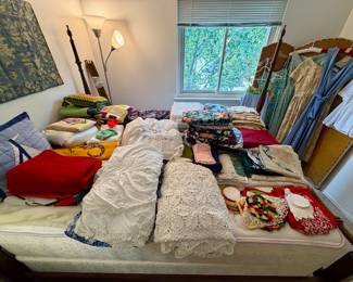 Lots of vintage linens and drapery.