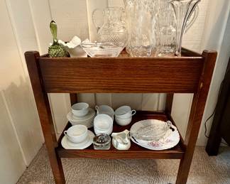 Vintage oak rolling table with drawer.