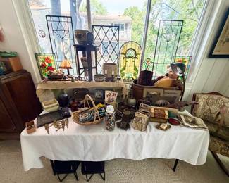 Table full of old and unique pieces.