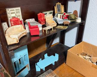 Various pieces of dollhouse furniture.