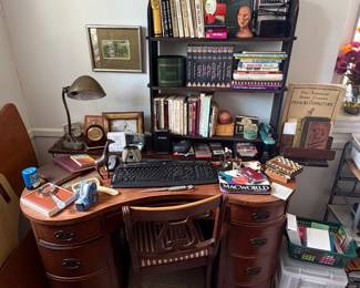 Vintage kidney shaped desk in the office.