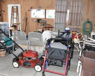 wheelchair, walkers, outdoor chairs, wagon, pots, Coleman stove, ladder, lawn decorations, metal garbage bins