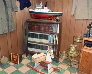 encyclopedias, plant stand, vintage army clothes and gear, RC model boat