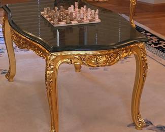 Ornate Rococo-style gold-gilt coffee table 