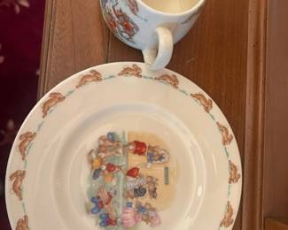 Royal Doulton Bunnykins child's mug and plate set:  English bone china child's mug and plate with hand-painted rabbit 'day at the fair/circus' scene and rabbit border, Royal Doulton Bunnykins nursery ware