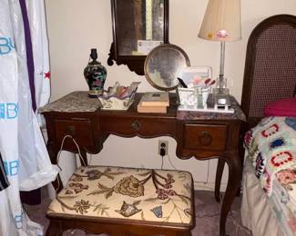 Antique Queen Anne-style vanity/dressing table with mirror and bench (3-piece set): Kneehole dressing table with cabriole legs and two drawers, scalloped-crest wall mirror, matching upholstered bench with needlepoint/crewel top.