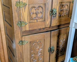 Antique ice box that has been refurbished