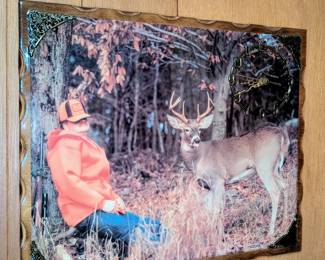 What would an estate sale be without the familiar picture of the sleeping deer hunter!
