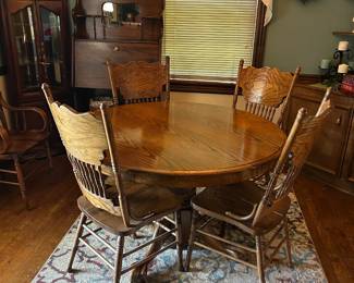 #24 round pedistal table with claw feet 48x29 4 chairs $130.00