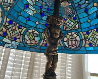 #9 tiffany style lamp with gold angel pass blue rose shade 32 tall $150.00