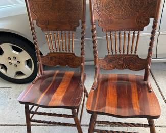 #178 pair of cedar carved back dining chairs (2) $60.00