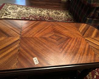 #37 inlay coffee table on base with shelf 35x17x19 $75.00