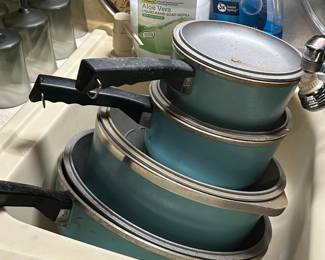 #121 aqua 8 piece cookware by Club $35.00