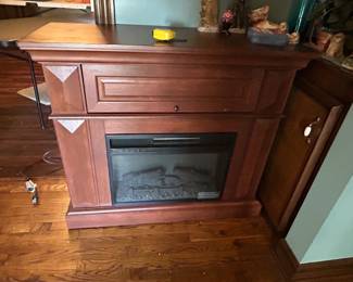 #29 electric fireplace heater SF 122-24AL $275.00