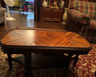 #37 inlay coffee table on base with shelf 35x17x19 $75.00