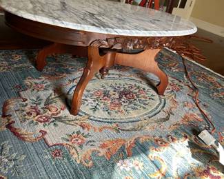 #13 marble top oval rose wood coffee table on 4 legs 45x28x18 $100.00