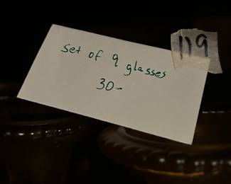 #119 9 gold embossed stemmed water glasses $30.00
