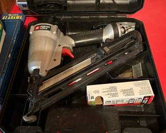 #184 porter cable nail gun air in case with 1 set of nails $75.00