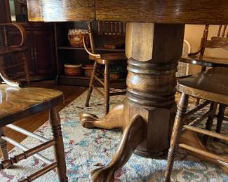 #24 round pedistal table with claw feet 48x29 4 chairs $130.00
