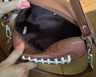 #208 foot ball purse with zipper open and shoulder strap $30.00