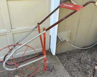 #228 tool shed white ranger hand plow $30.00