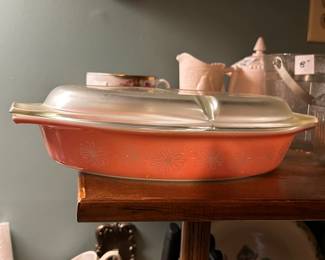 #112 Pyrex pink snowflake divided casserole dish with lid $50.00
