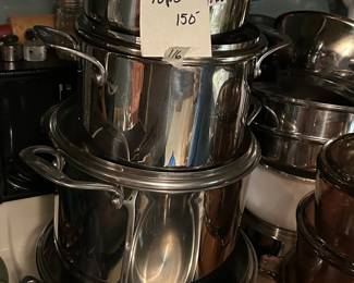 #116 Emeril 10 piece cookware set $150.00