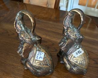 #86 metal heavy pair of elephants nose up 9 tall $25.00