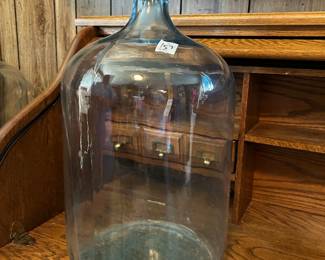 #157 glass wine jug with cork 19 tall $30.00