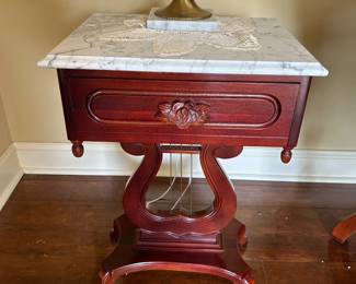 #13 marble top oval rose wood coffee table on 4 legs 45x28x18 $100.00