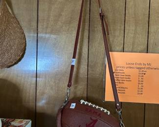#208 foot ball purse with zipper open and shoulder strap $30.00