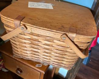 #77 Longaberger med picnic basket leather straps taggle closure wood riser as is finish $38.00