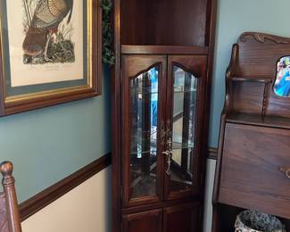 #27 lighted display cabinet with 2 wood doors, 2 glass doors 2 glass shelves 24x12x76 $65.00